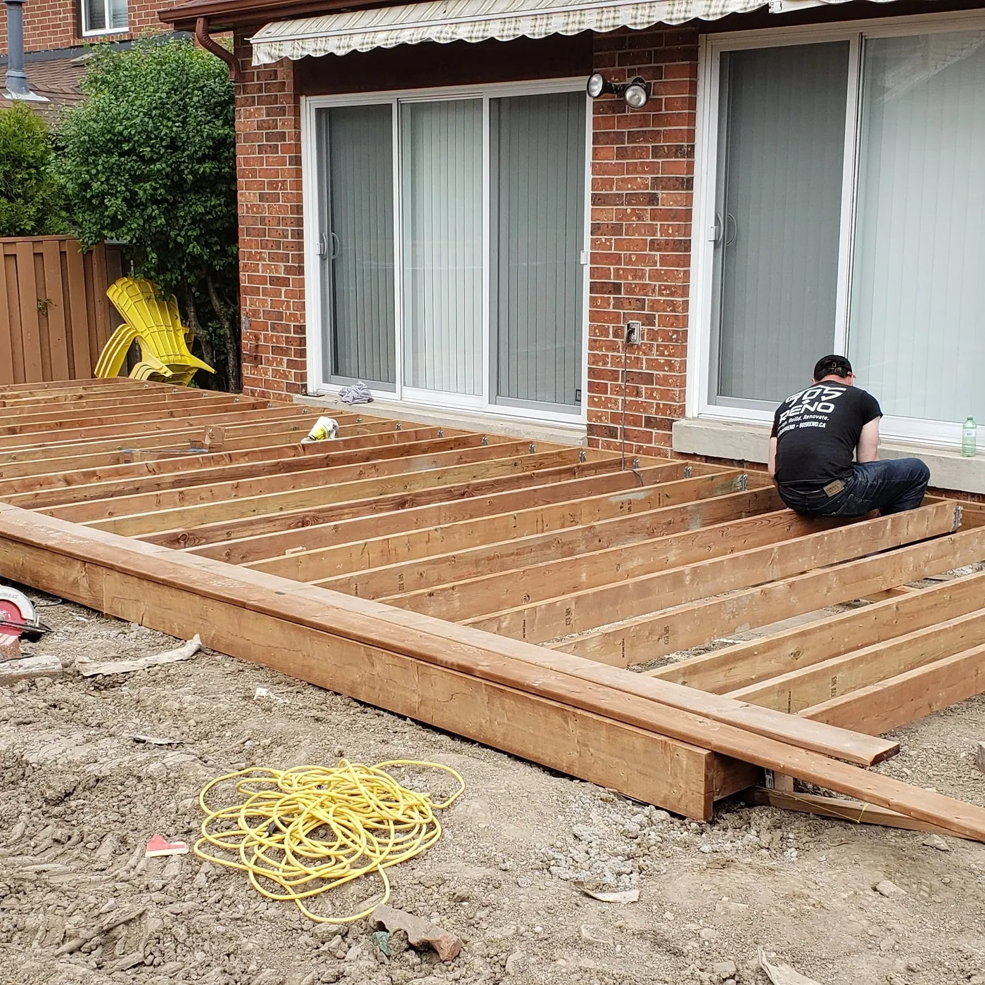 Deck boards going down over the new frame, Aurora
