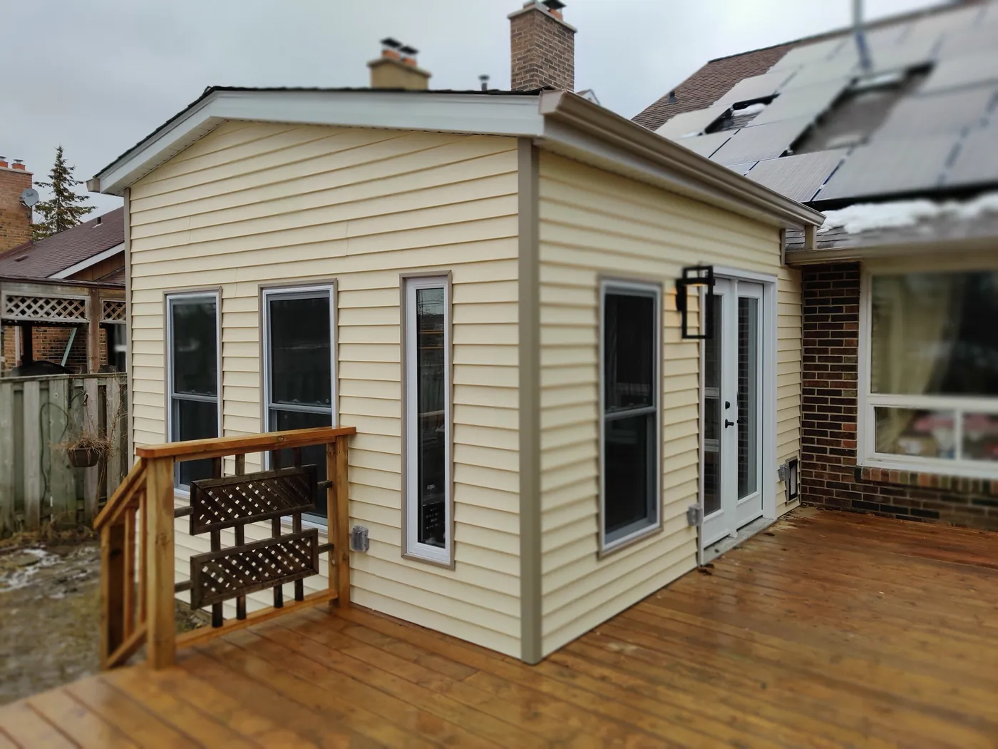 Finished pressure-treated deck and steps at the back of the house, Brampton
