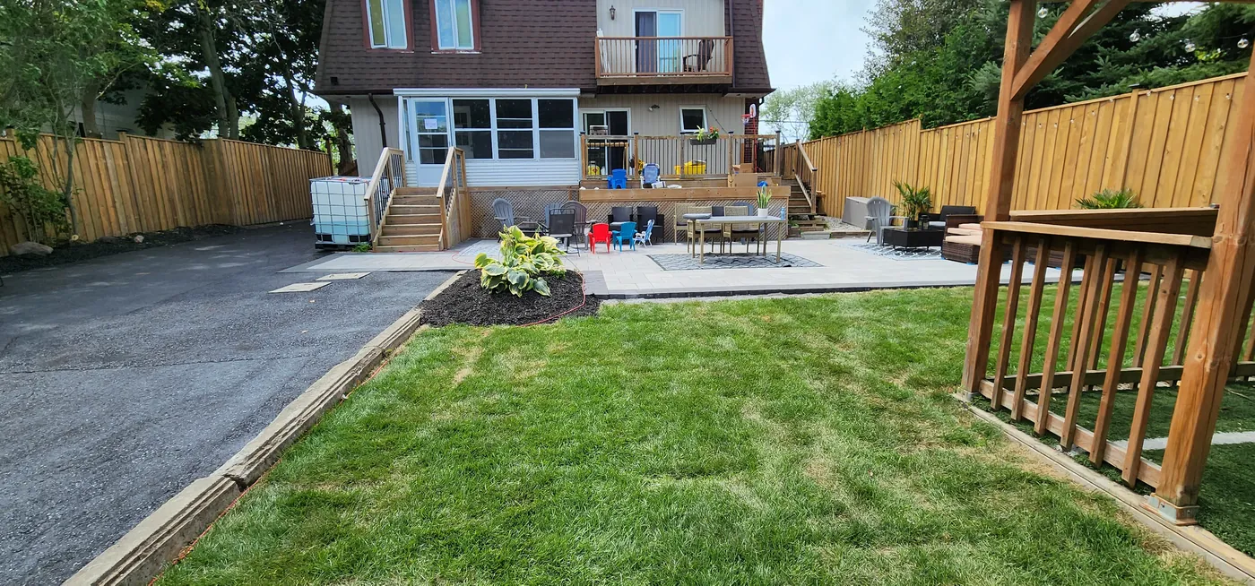 The fence line along the side of the house and driveway, Clarington