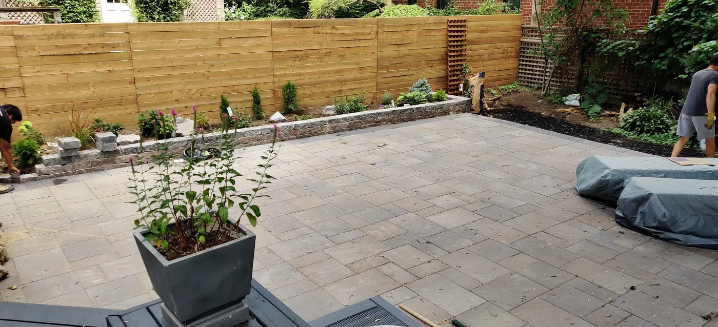 Paver patio and 6 ft horizontal privacy fence in an East York backyard