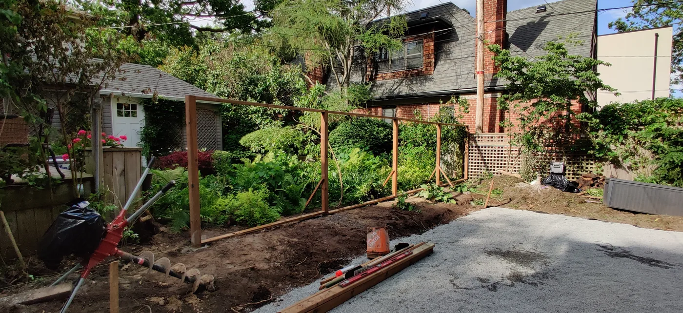 Fence posts and rails set before the horizontal boards went on in East York