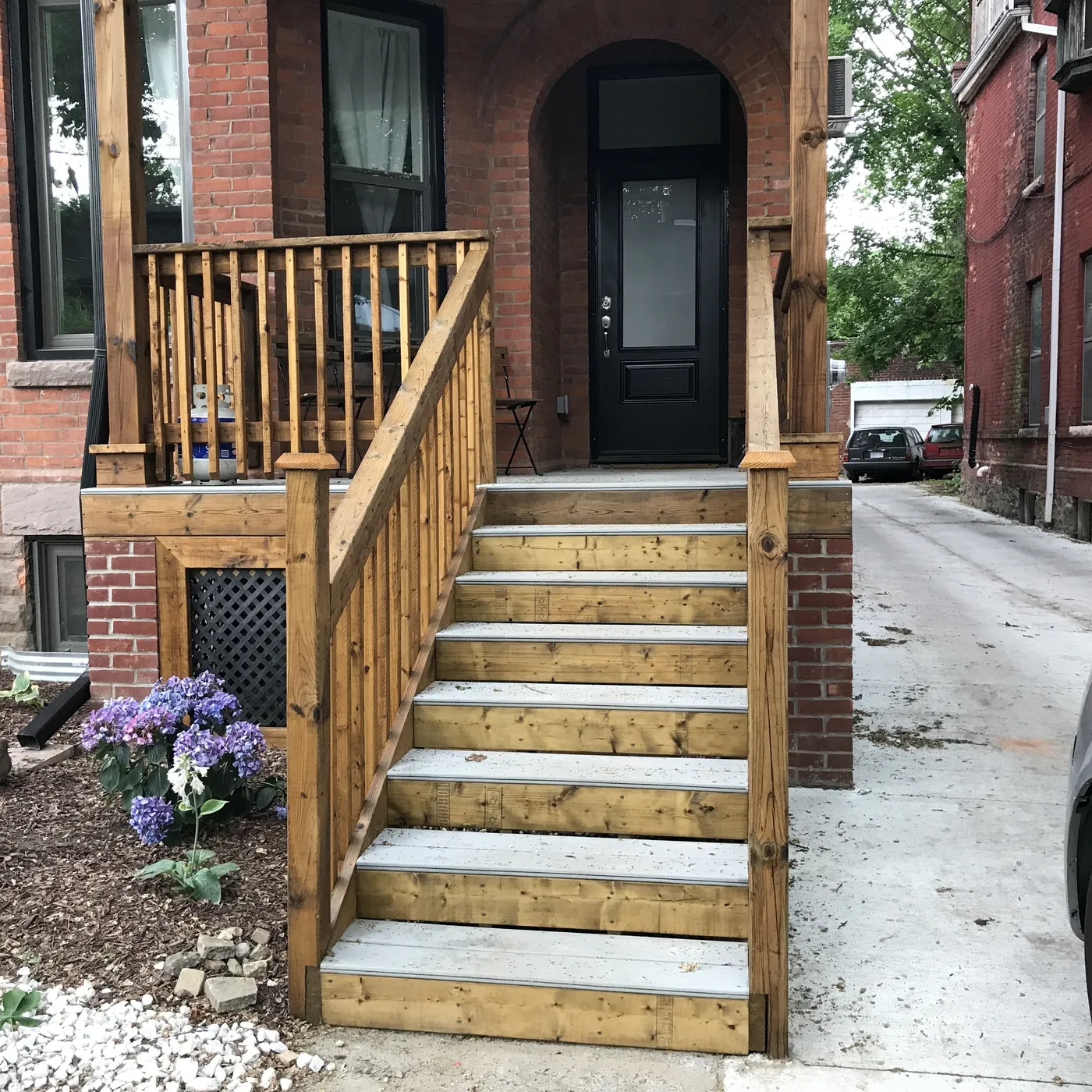 New porch steps and railing at the front entrance, Etobicoke
