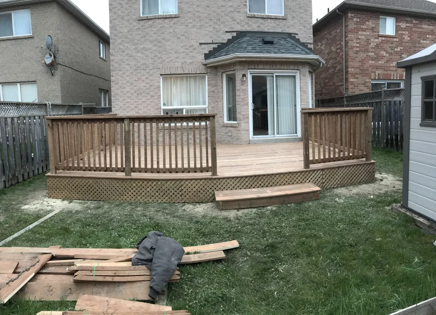 Pressure-treated deck running the full width of the back of the house, Newmarket