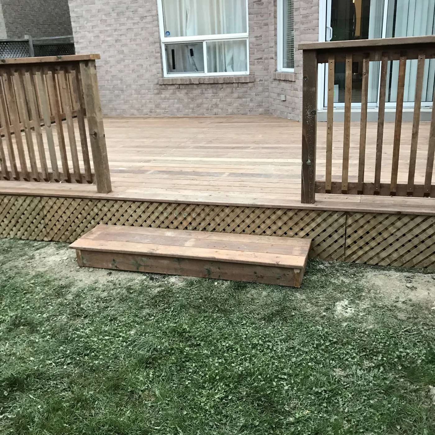 Lattice skirting closing in below the deck frame, Newmarket
