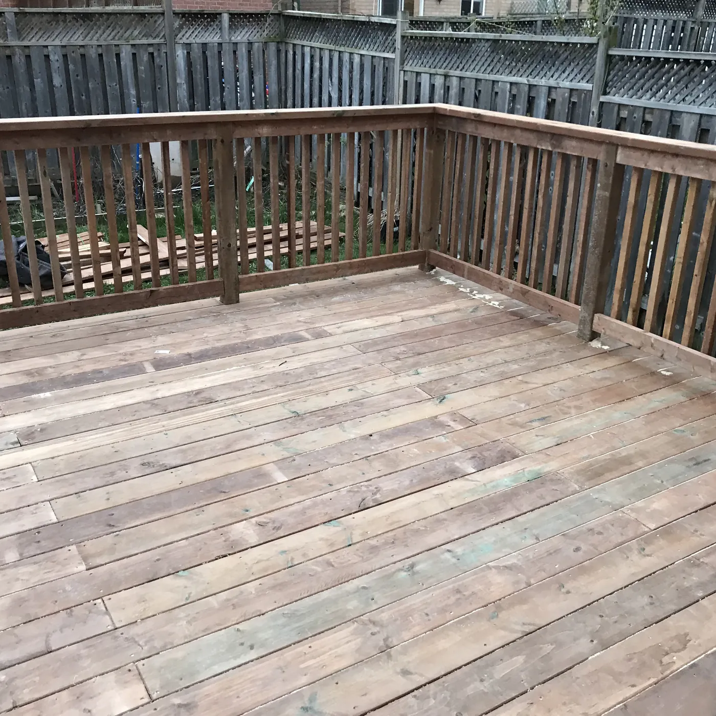 Corner of the deck railing looking down the yard, Newmarket