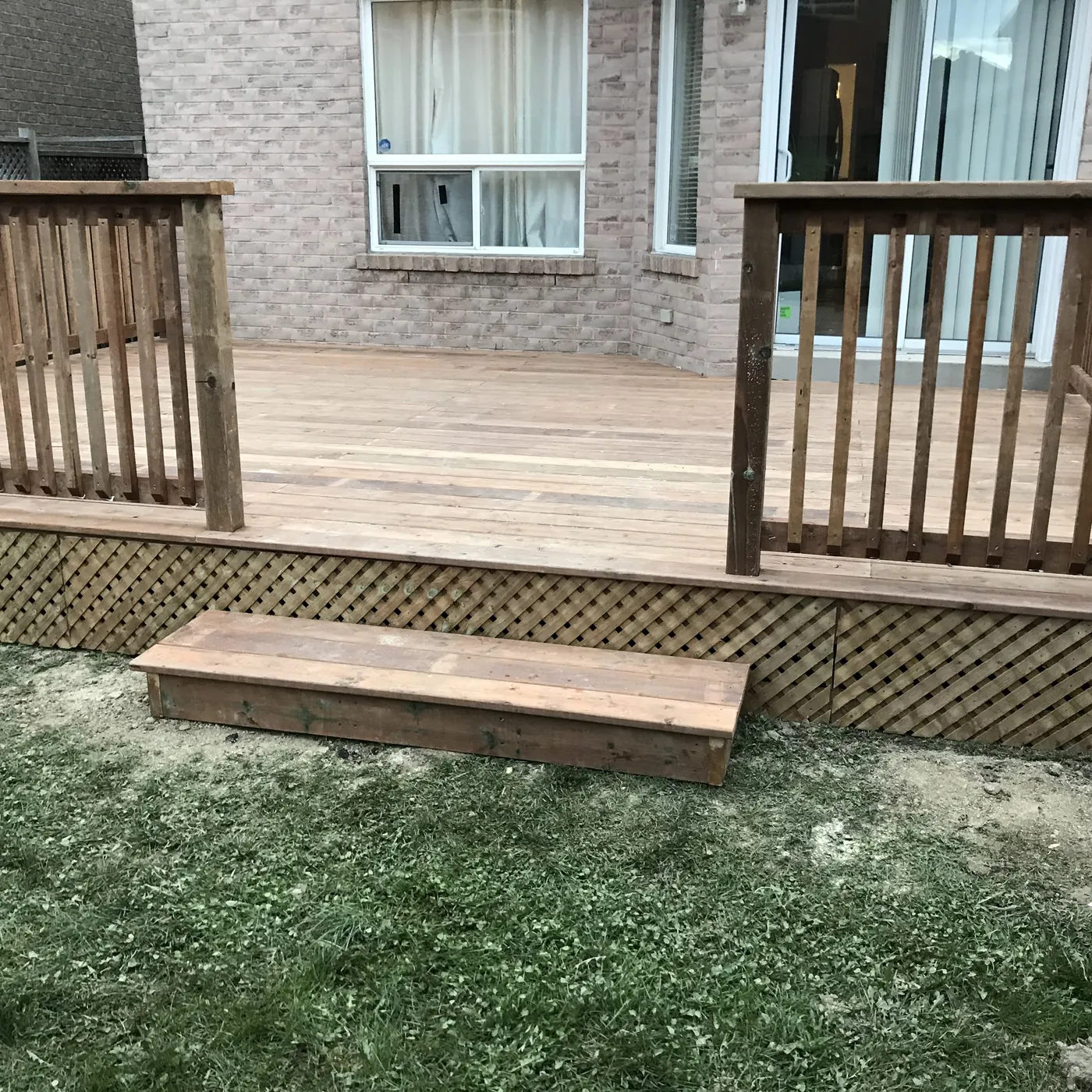 Pressure-treated railing along the side of the deck, Newmarket