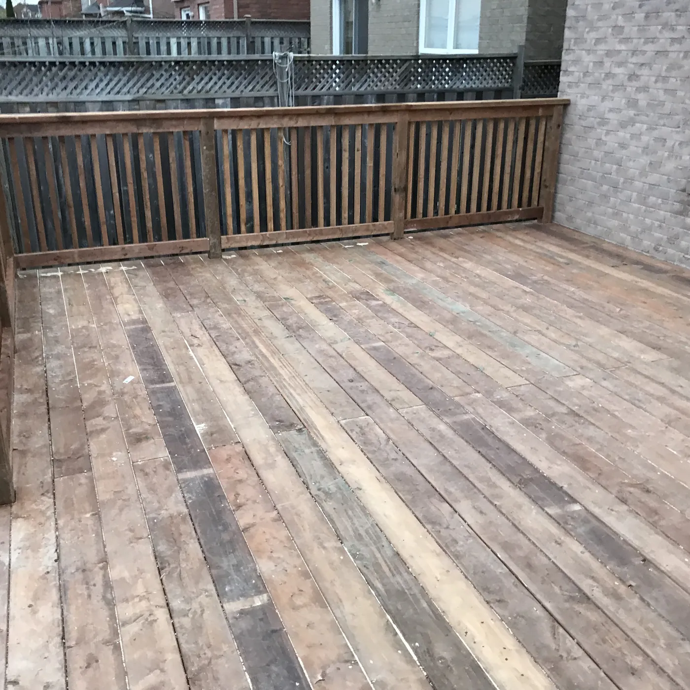 Deck boards and railing with the house behind, Newmarket