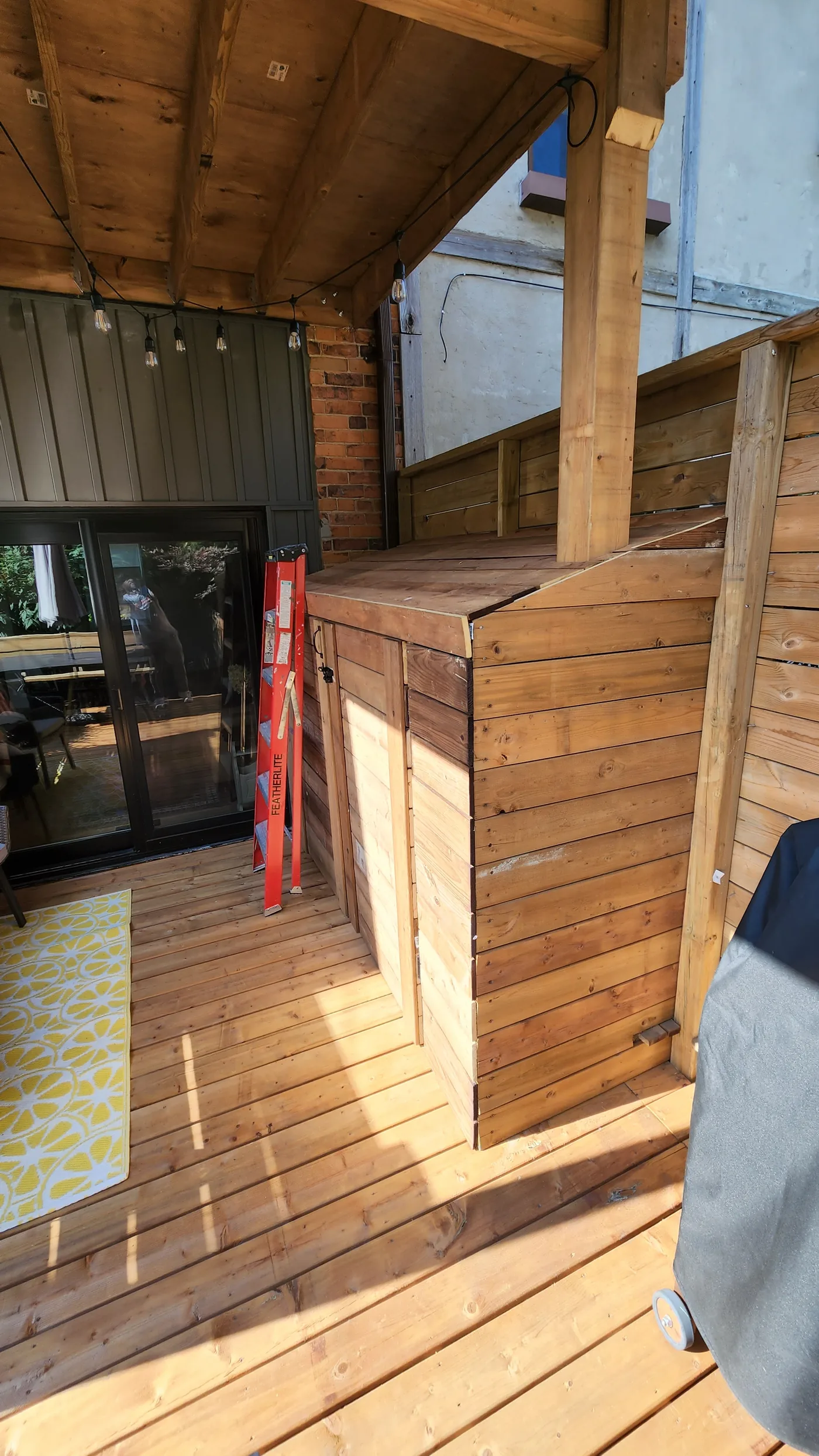Storage built into the lower deck beside the doors in North York