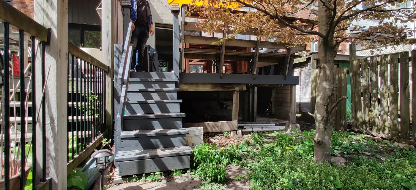 The 25 year old deck at the back of a North York home before it was taken out