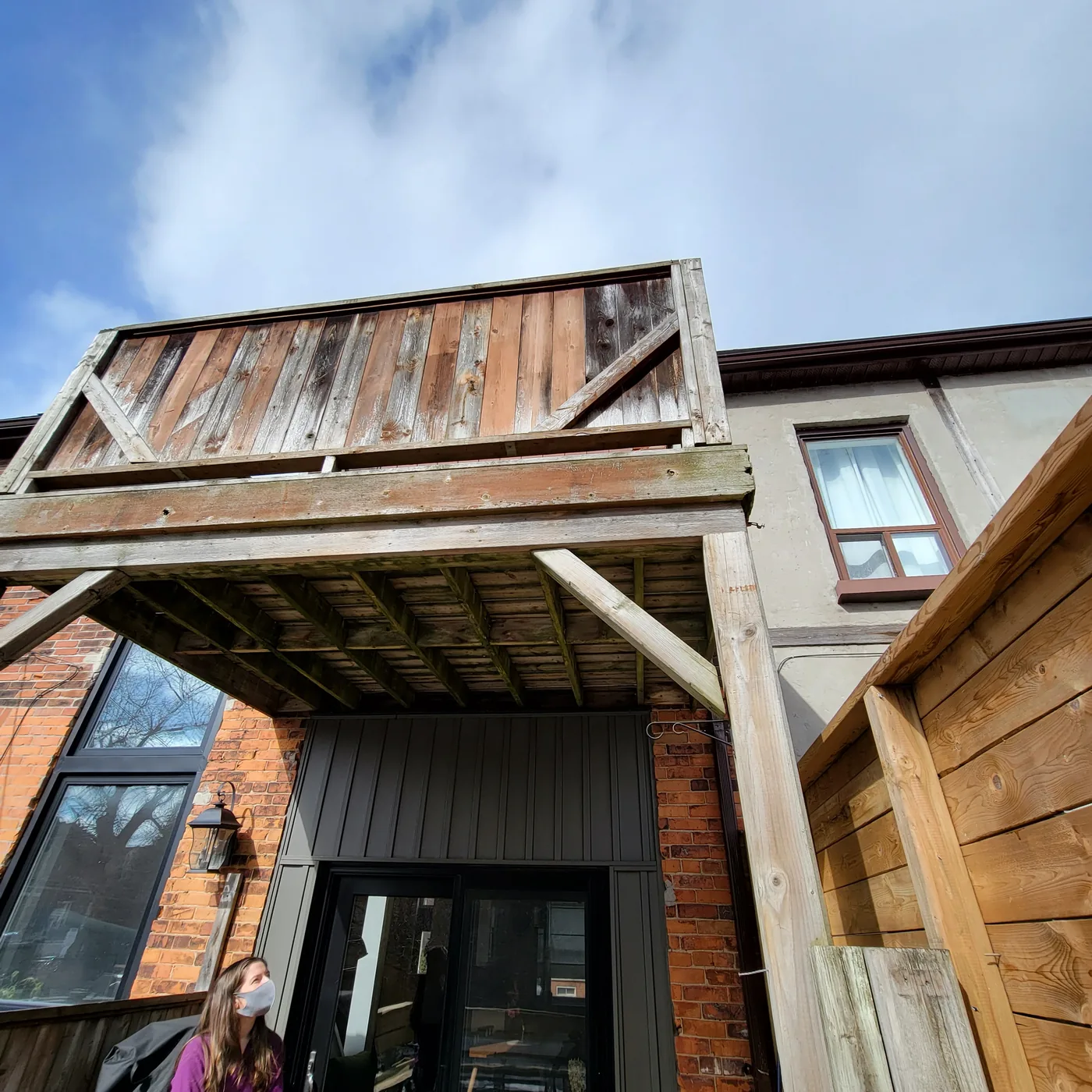 The old two-level deck at the back of the North York house before it was rebuilt