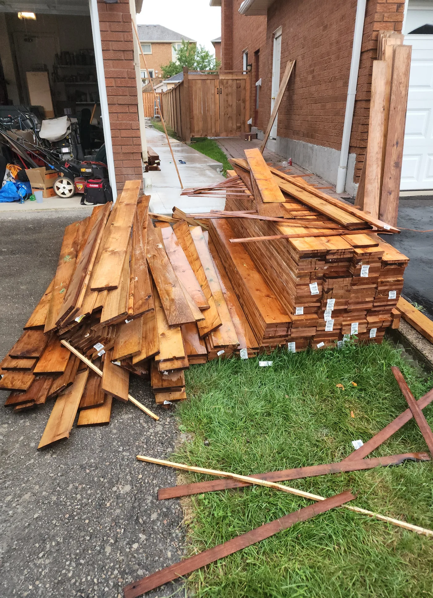 Pressure-treated fence lumber on site in Richmond Hill