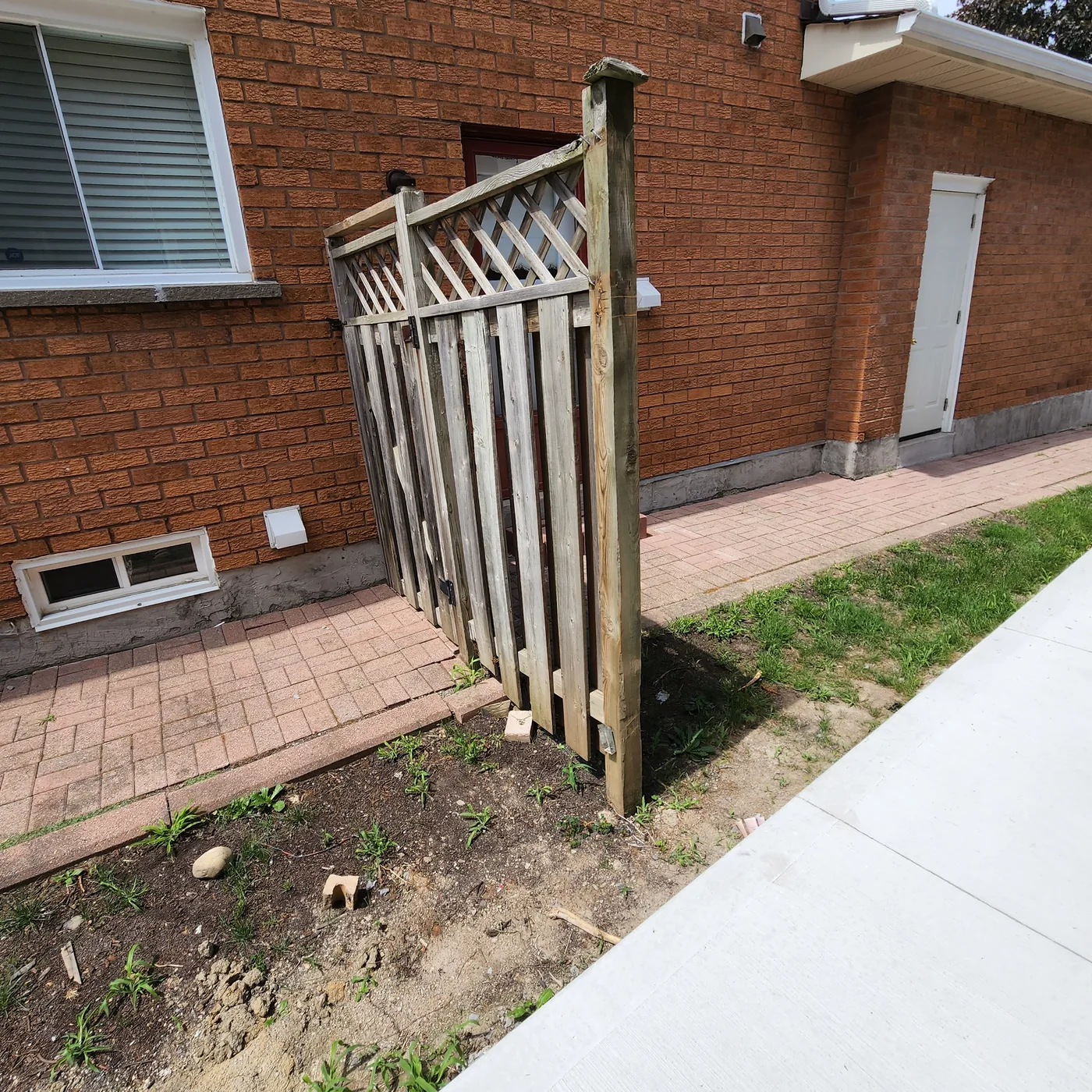 The old lattice gate at the side of the house before it was replaced