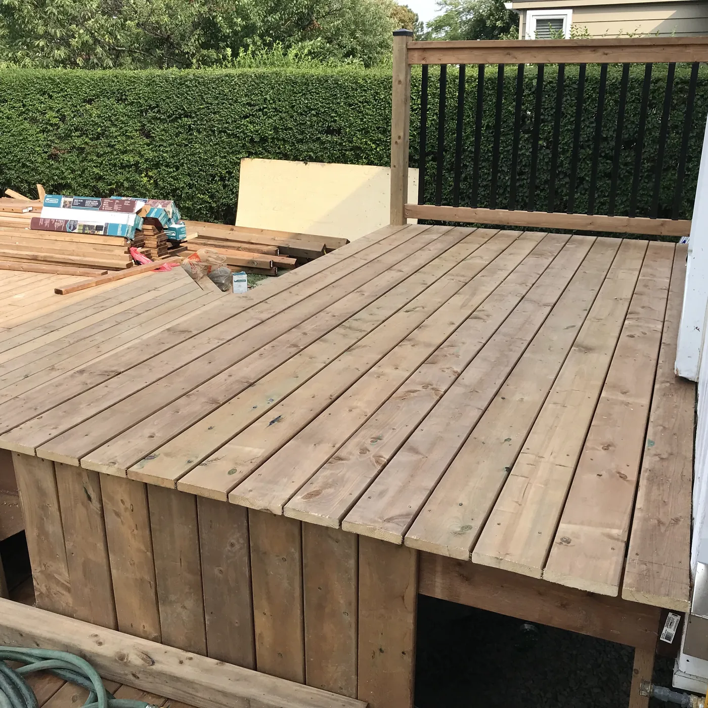 Deck edge and step where the pool deck meets the garden, Richmond Hill