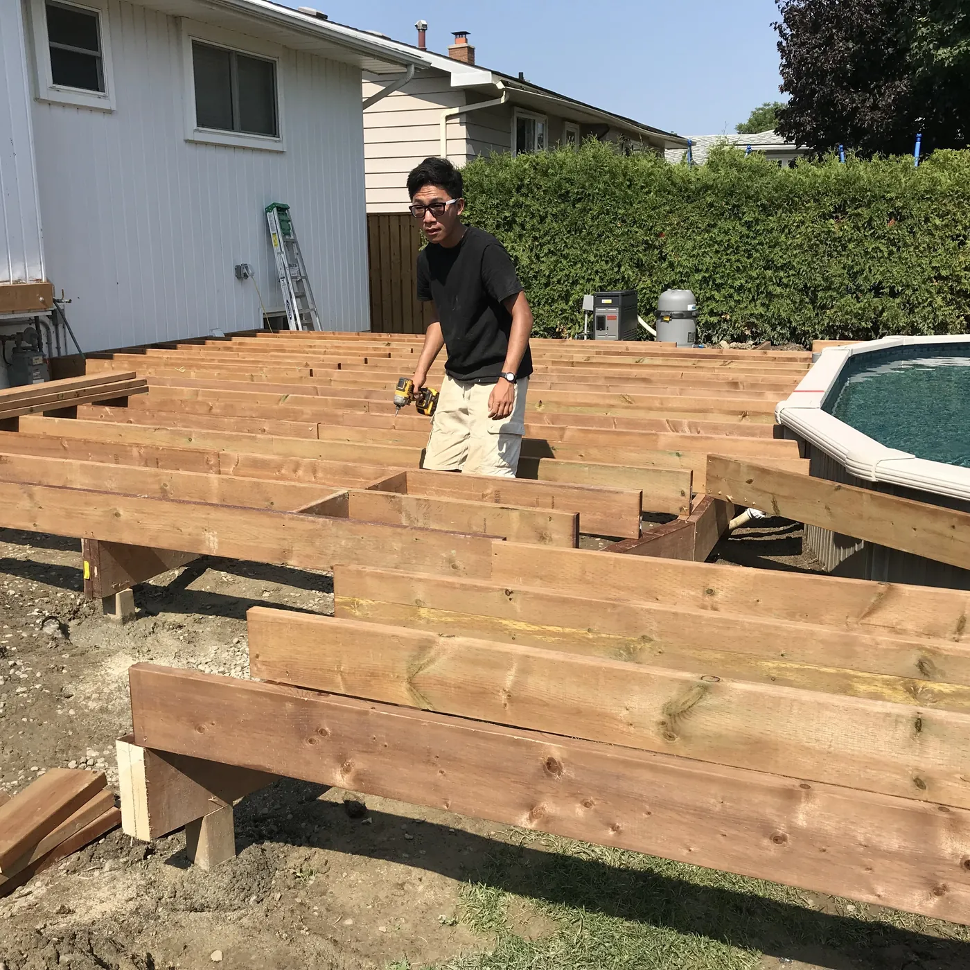 Deck frame built out around the pool, Richmond Hill