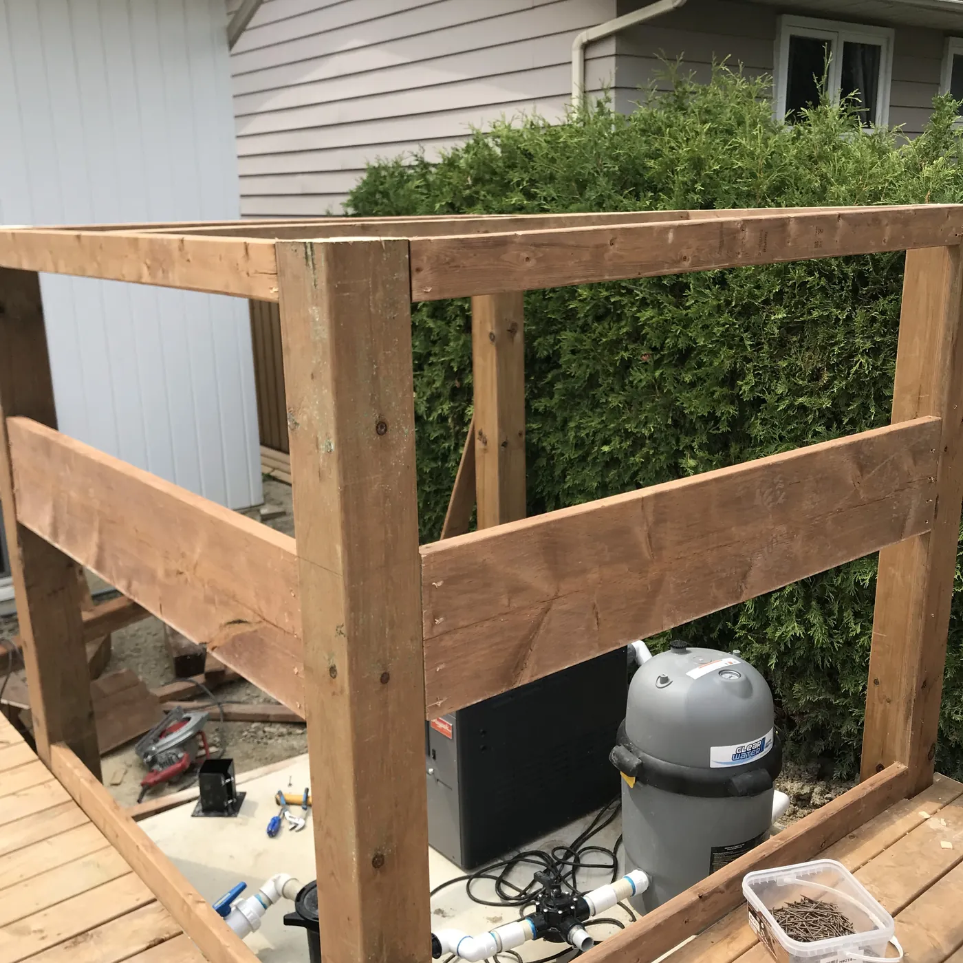 Frame built to screen the pool pump and filter, Richmond Hill