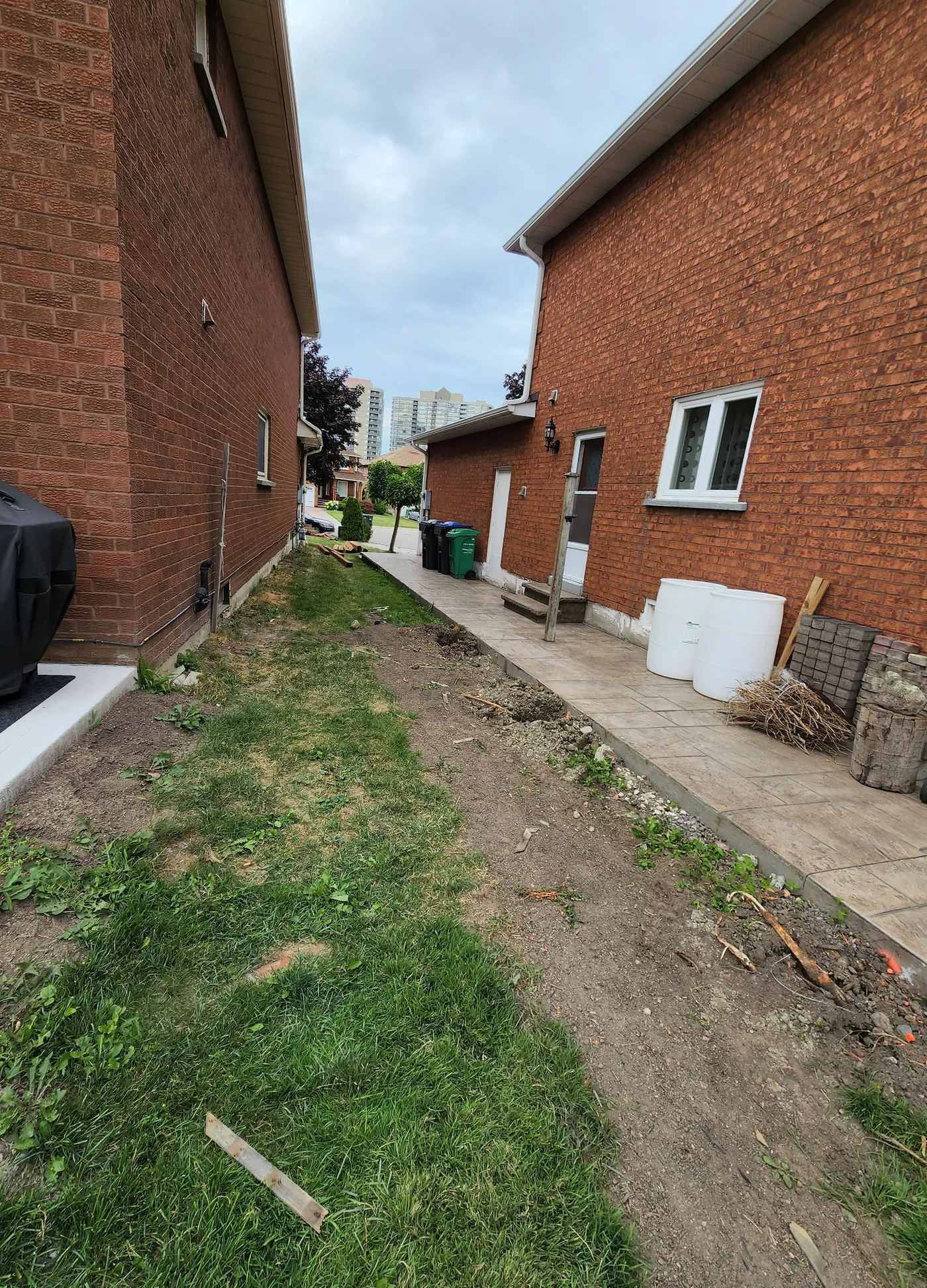 The side yard in Richmond Hill before the new fence and gate went in