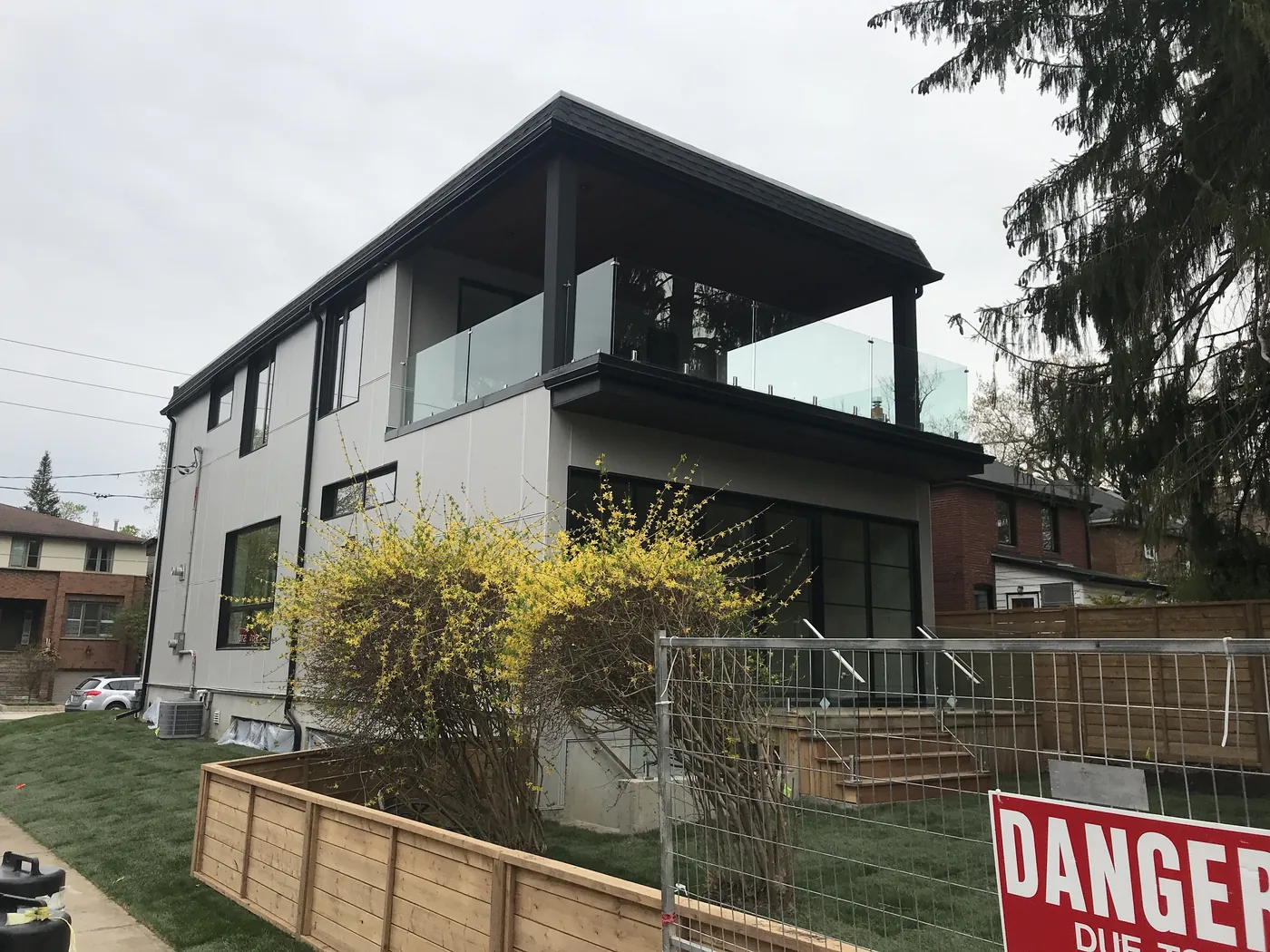 Cedar deck and glass balcony on a modern Scarborough house