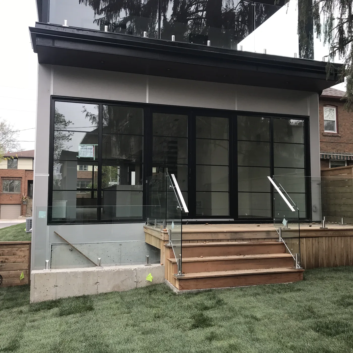 Cedar steps with stainless handrails at the front entrance, Scarborough