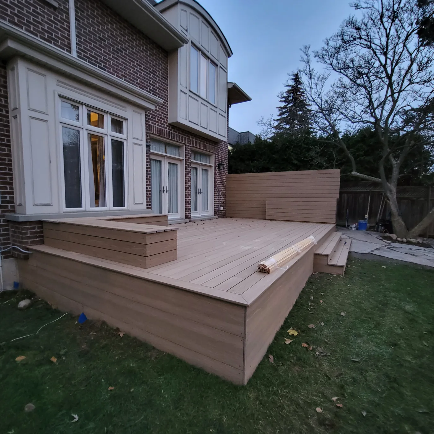 New composite deck and privacy screen in Toronto before the glass railings went on