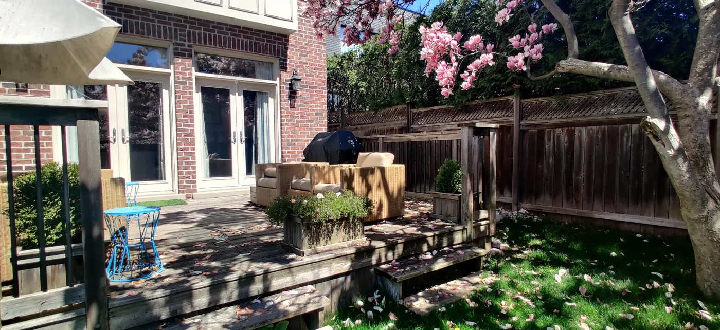 Grey wood decking and old railings on the Toronto deck that was taken out
