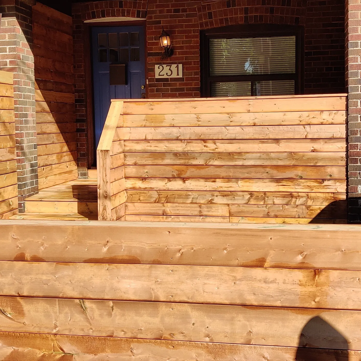 Opening left in the cedar screen for the steps and front door, Toronto