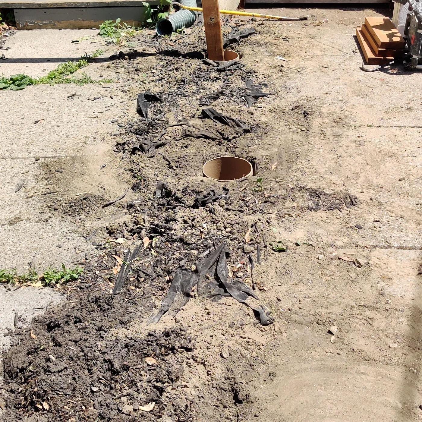 Ground under the porch dug out and levelled before framing, Toronto