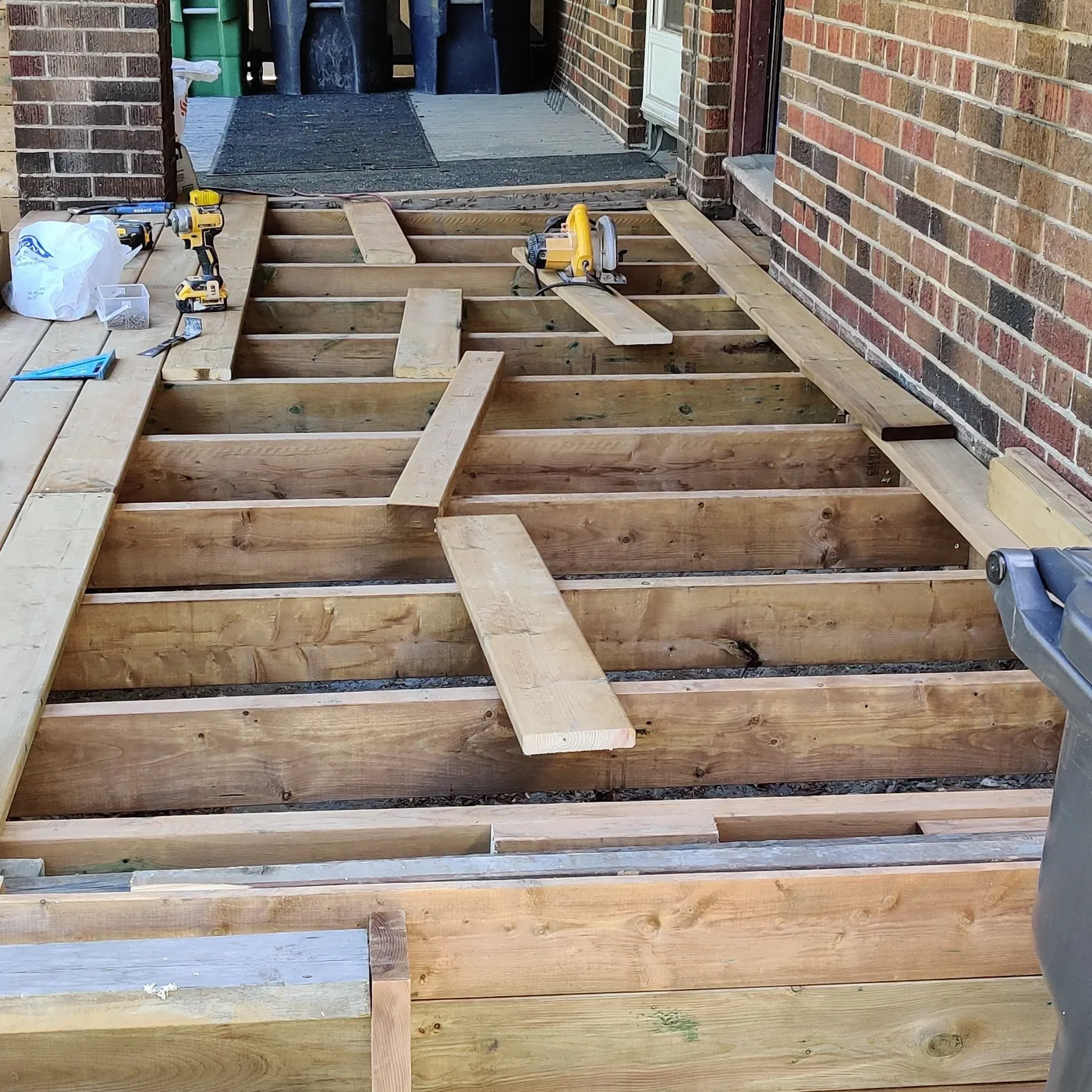 New joists set across the porch ready for cedar decking, Toronto