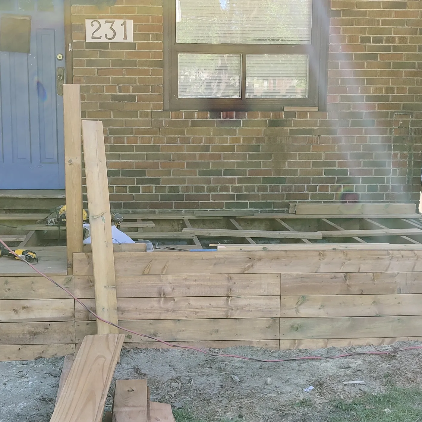 Frame fixed back to the house before the privacy screen went up, Toronto