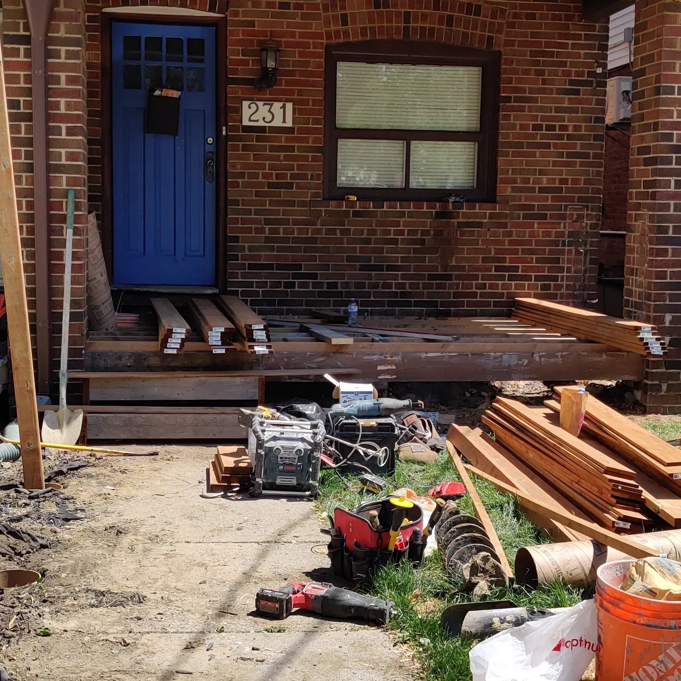 Porch cleared and the old material stacked ready to go, Toronto