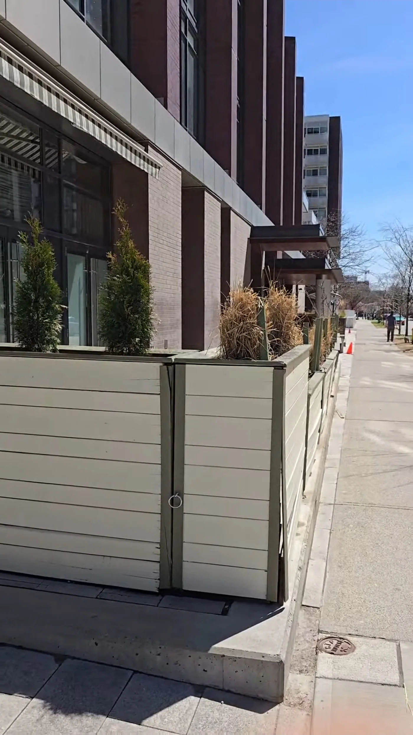 The restaurant patio before, closed in with painted planter walls