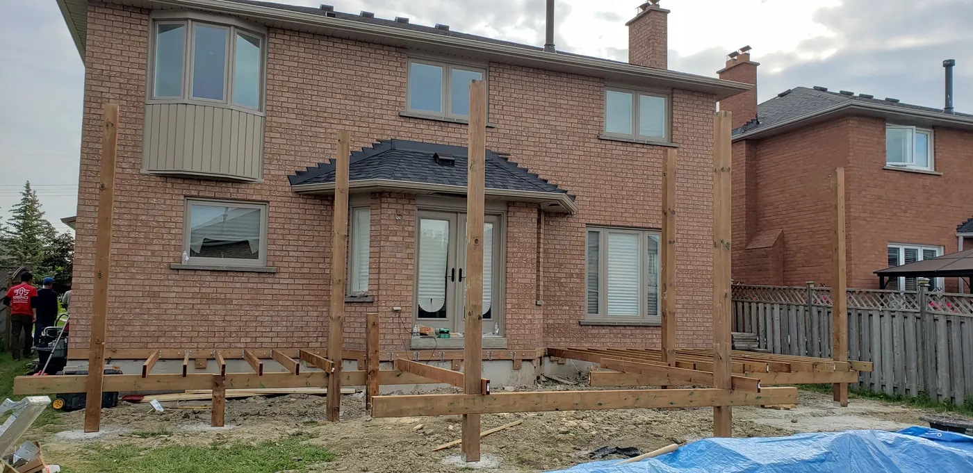 Deck layout with posts set at the start of a Vaughan deck build